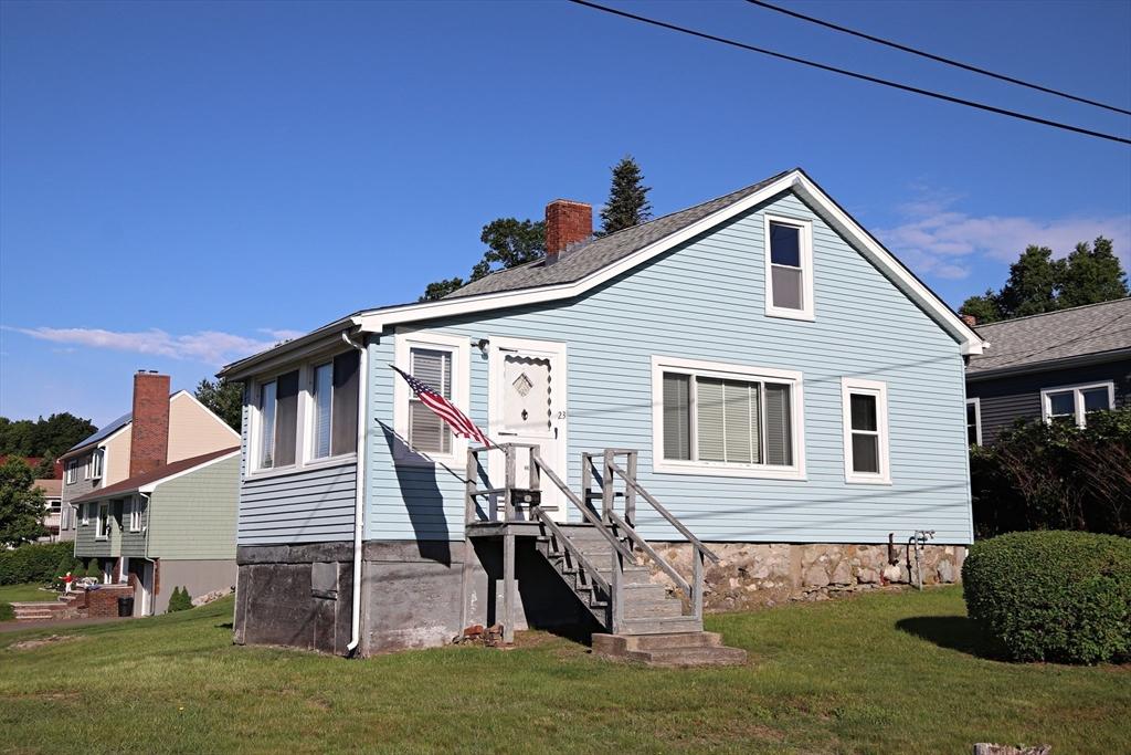 23 Bay View Rd, Saugus, MA 01906 - bungalow-style house featuring a chimney and a front lawn