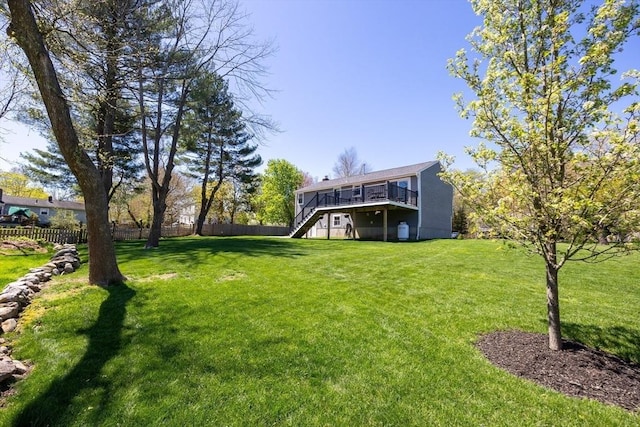 27 Ann St, Raynham, MA 02767 - view of yard with stairway and a wooden deck