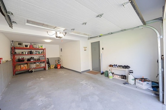 27 Ann St, Raynham, MA 02767 - garage featuring a garage door opener