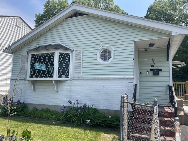 67 Oakcrest Rd, Boston, MA 02136 - view of side of home with brick siding