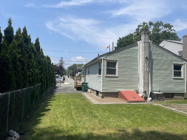 67 Oakcrest Rd, Boston, MA 02136 - view of side of home with a central air condition unit