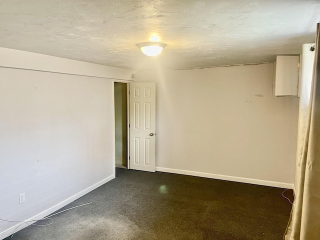 67 Oakcrest Rd, Boston, MA 02136 - unfurnished room with baseboards and dark colored carpet