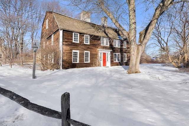 colonial home with a chimney