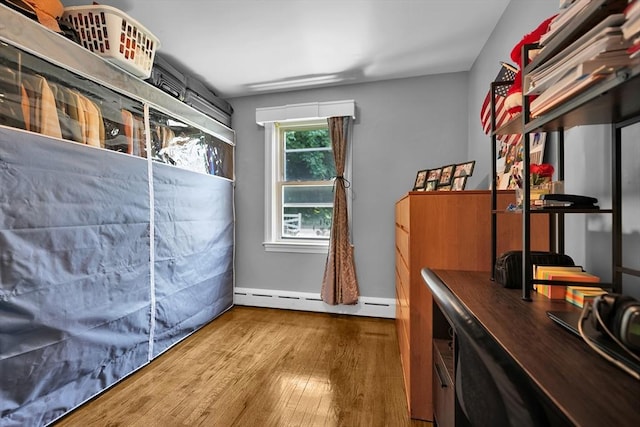 313 Walter St, Fall River, MA 02724 - bedroom featuring a baseboard radiator and wood finished floors