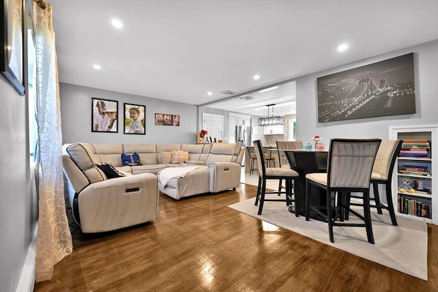 313 Walter St, Fall River, MA 02724 - living area featuring wood finished floors and recessed lighting