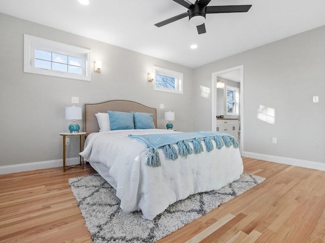 bedroom featuring ceiling fan and light hardwood / wood-style flooring