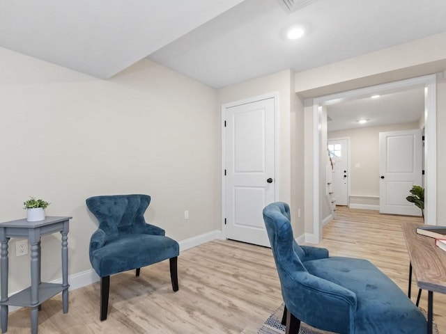 sitting room featuring light wood-type flooring