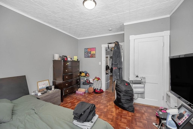 bedroom with ornamental molding and an ornate ceiling