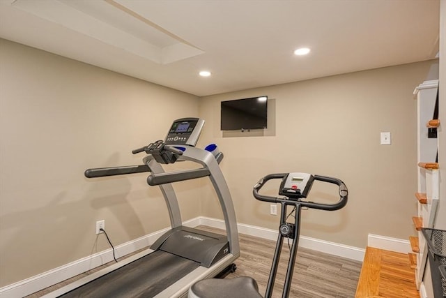 7 Luan Cir, Chelmsford, MA 01824 - exercise room with wood finished floors, recessed lighting, and baseboards