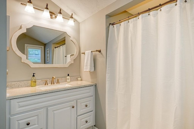 7 Luan Cir, Chelmsford, MA 01824 - full bathroom featuring vaulted ceiling and vanity