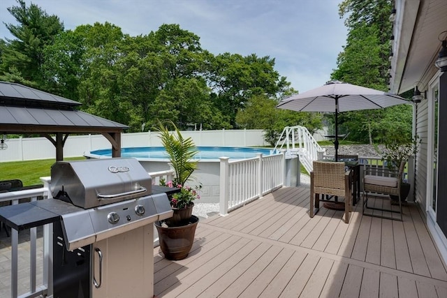 7 Luan Cir, Chelmsford, MA 01824 - deck featuring a gazebo, outdoor dining area, and area for grilling
