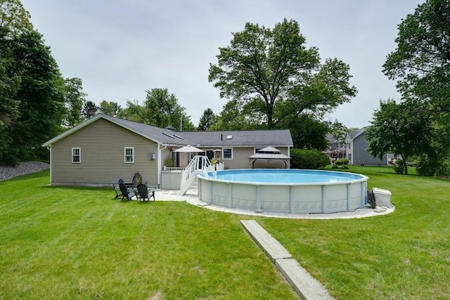7 Luan Cir, Chelmsford, MA 01824 - back of house featuring a gazebo, an outdoor pool, a yard, and a deck