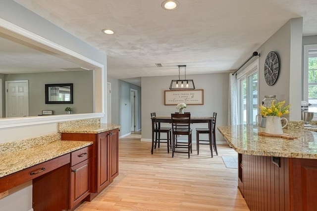 7 Luan Cir, Chelmsford, MA 01824 - dining room featuring light wood-style floors, recessed lighting, and baseboards