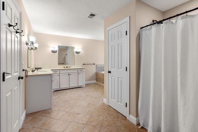 23 Crimson Dr, Shrewsbury, MA 01545 - full bathroom featuring tile patterned flooring, double vanity, a bathtub, and baseboards
