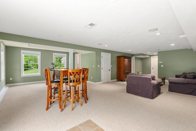 23 Crimson Dr, Shrewsbury, MA 01545 - dining area with light colored carpet, baseboards, and recessed lighting