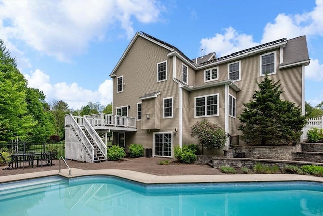 23 Crimson Dr, Shrewsbury, MA 01545 - view of swimming pool with stairs, a wooden deck, a patio area, fence, and cooling unit