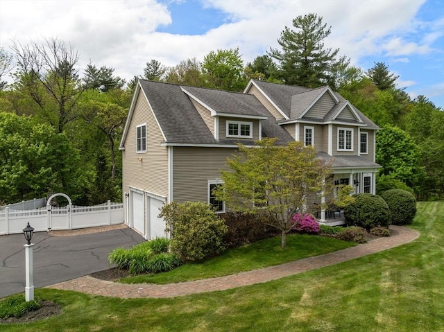 23 Crimson Dr, Shrewsbury, MA 01545 - view of front of home with a garage and asphalt driveway