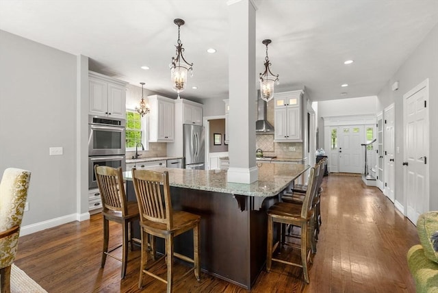 23 Crimson Dr, Shrewsbury, MA 01545 - kitchen with stainless steel appliances, a sink, tasteful backsplash, dark wood-style floors, and recessed lighting