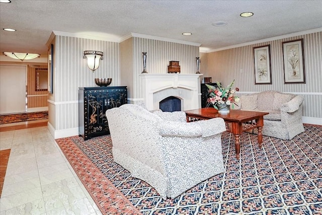 living area featuring a fireplace, ornamental molding, a textured ceiling, recessed lighting, and baseboards