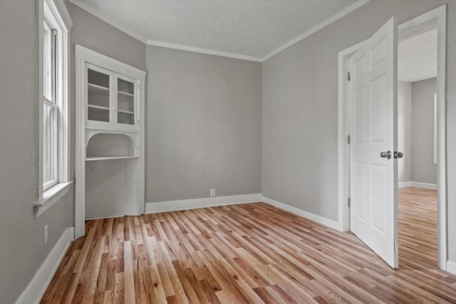 8 Hobson Ave, Worcester, MA 01603 - spare room with wood finished floors and crown molding