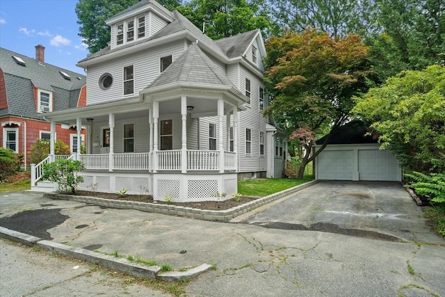 8 Hobson Ave, Worcester, MA 01603 - view of front facade featuring covered porch, an outdoor structure, and a garage