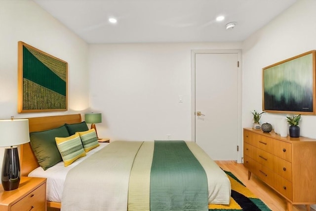 bedroom featuring light hardwood / wood-style floors