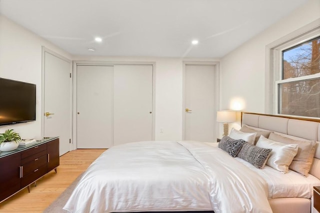 bedroom featuring light hardwood / wood-style floors