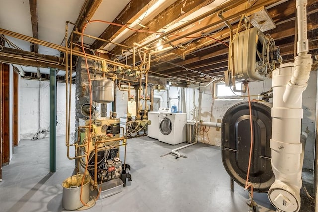 basement featuring washer and clothes dryer