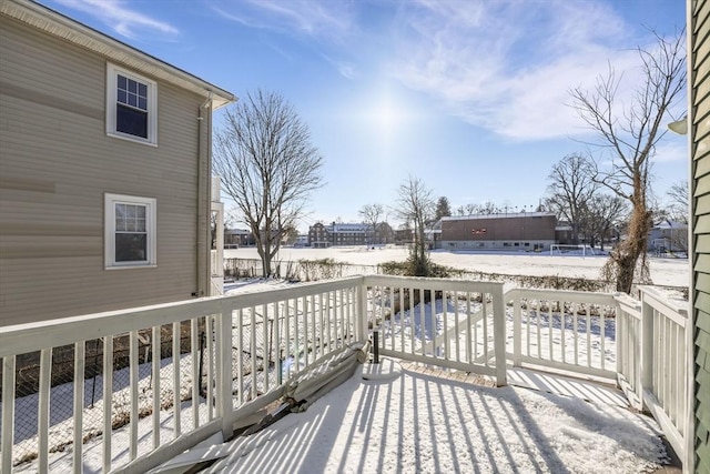 view of snow covered deck