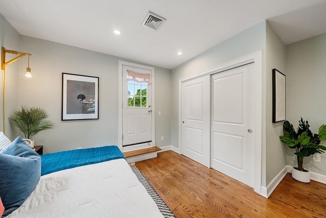 225 Amory St, Boston, MA 02130 - bedroom featuring light wood finished floors, baseboards, recessed lighting, and a closet