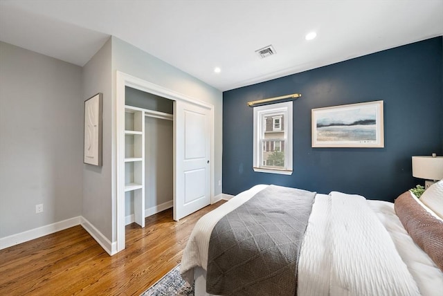 225 Amory St, Boston, MA 02130 - bedroom featuring wood finished floors, baseboards, recessed lighting, and a closet