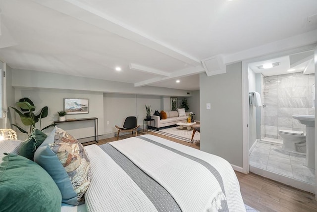 225 Amory St, Boston, MA 02130 - bedroom with wood finished floors, recessed lighting, baseboards, and ensuite bathroom