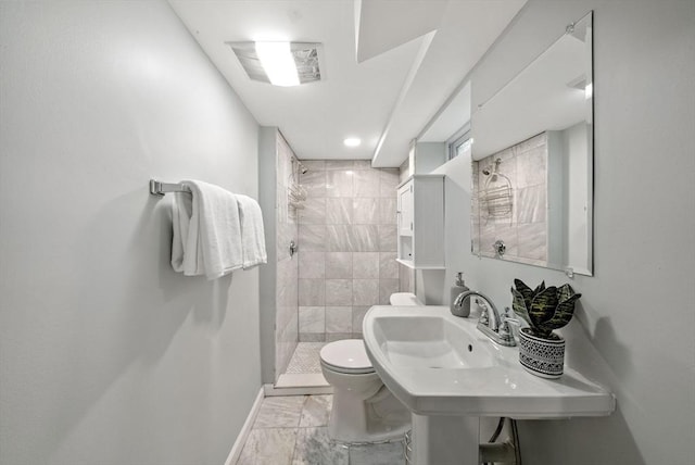 225 Amory St, Boston, MA 02130 - full bathroom featuring marble look tiles, toilet, tiled shower, baseboards, and a sink