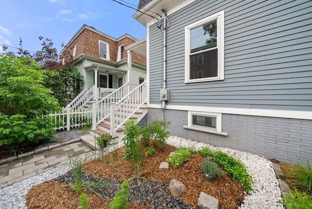 225 Amory St, Boston, MA 02130 - doorway to property with covered porch