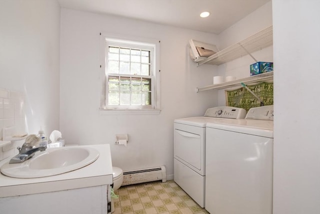 231 Audubon Rd, Northampton, MA 01053 - laundry area featuring a baseboard heating unit, separate washer and dryer, and light floors