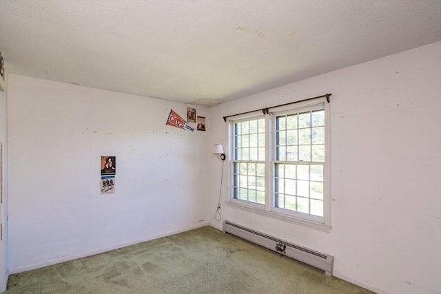231 Audubon Rd, Northampton, MA 01053 - empty room featuring a baseboard radiator and carpet floors