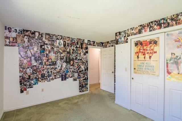 231 Audubon Rd, Northampton, MA 01053 - empty room with carpet floors, wallpapered walls, and baseboards