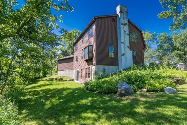 231 Audubon Rd, Northampton, MA 01053 - view of side of property with a yard and a chimney