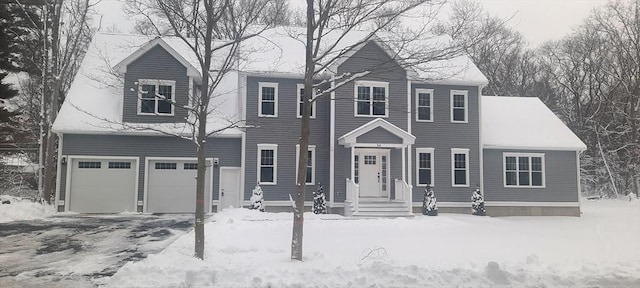 view of front of property featuring a garage