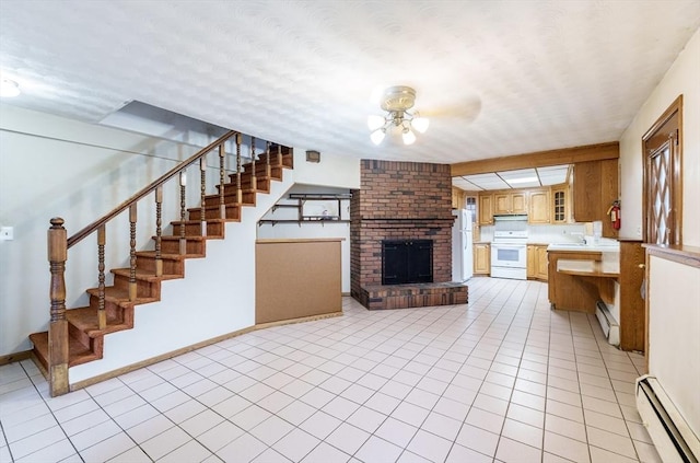 20 Cady St, Ludlow, MA 01056 - unfurnished living room featuring a baseboard radiator, ceiling fan, stairway, light tile patterned floors, and a fireplace