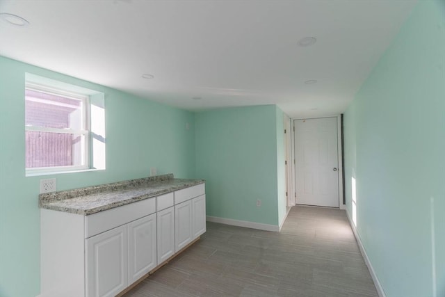 kitchen with white cabinetry