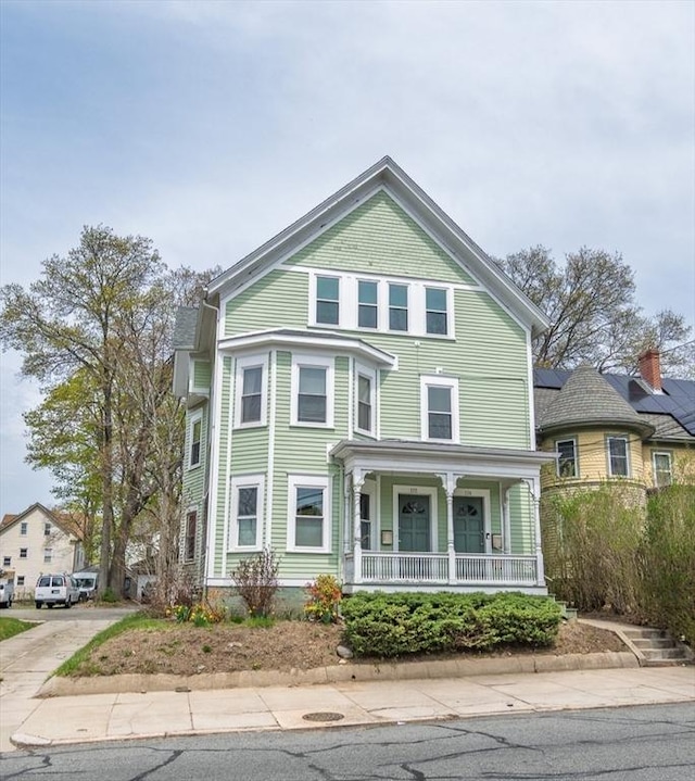 172 Doyle Ave Unit 1, Providence, RI 02906 - victorian home with covered porch