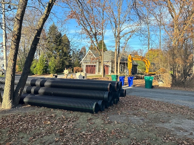 view of yard with a garage