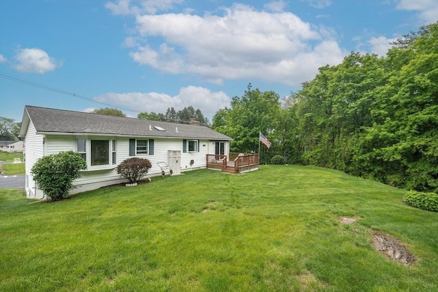 453 Homestead Ave, Holyoke, MA 01040 - back of house with a deck, a yard, and a chimney