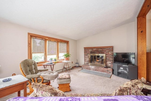 453 Homestead Ave, Holyoke, MA 01040 - living room with lofted ceiling, carpet floors, a baseboard heating unit, a fireplace, and a textured ceiling