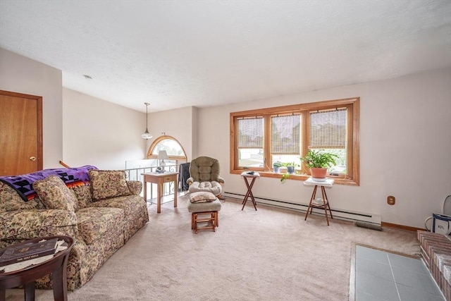 453 Homestead Ave, Holyoke, MA 01040 - carpeted living room with a baseboard heating unit and baseboards
