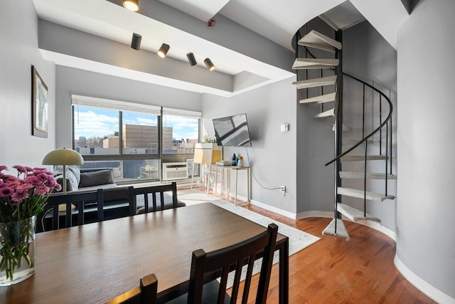 dining room with hardwood / wood-style floors