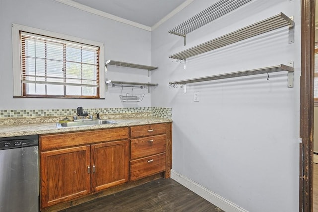 40 By St, Lowell, MA 01850 - bathroom featuring a sink, ornamental molding, wood finished floors, baseboards, and tasteful backsplash