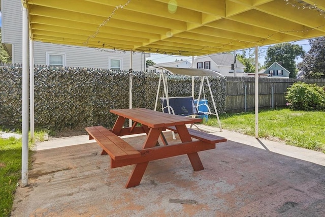 40 By St, Lowell, MA 01850 - fenced backyard featuring a patio and outdoor dining area