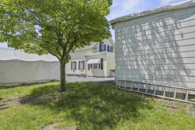 40 By St, Lowell, MA 01850 - rear view of house featuring a patio area